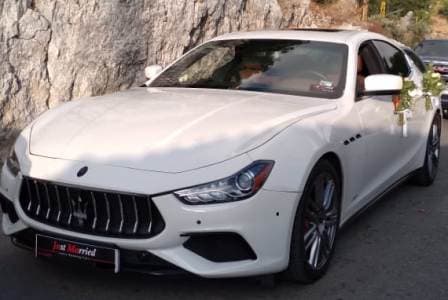 Luxury taxi Maserati Ghibli on the road driven by professional driver of Limo Beirut